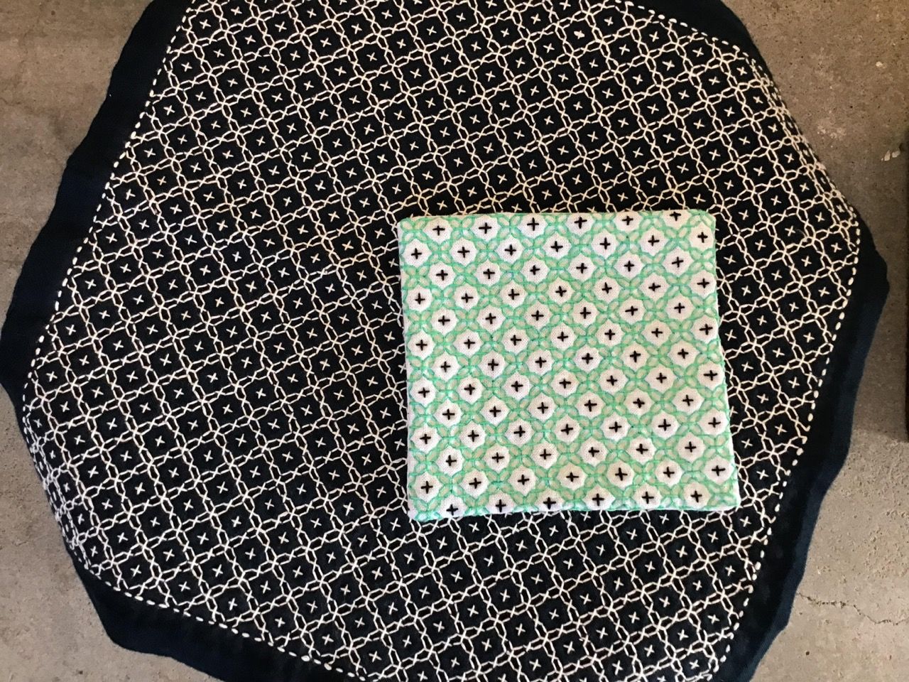 Two sashiko creations featuring Jujihanazashi.