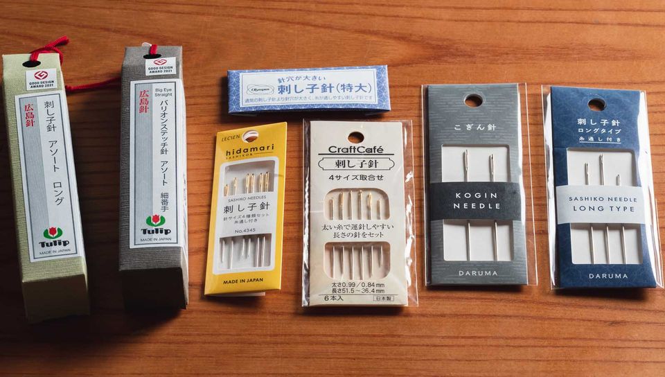 7 different packages of sashiko needles by 5 different brands