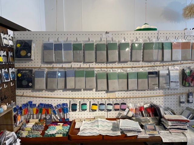 The inside of Oomae Nunoten showing sashiko supplies from Yokota and other brands.
