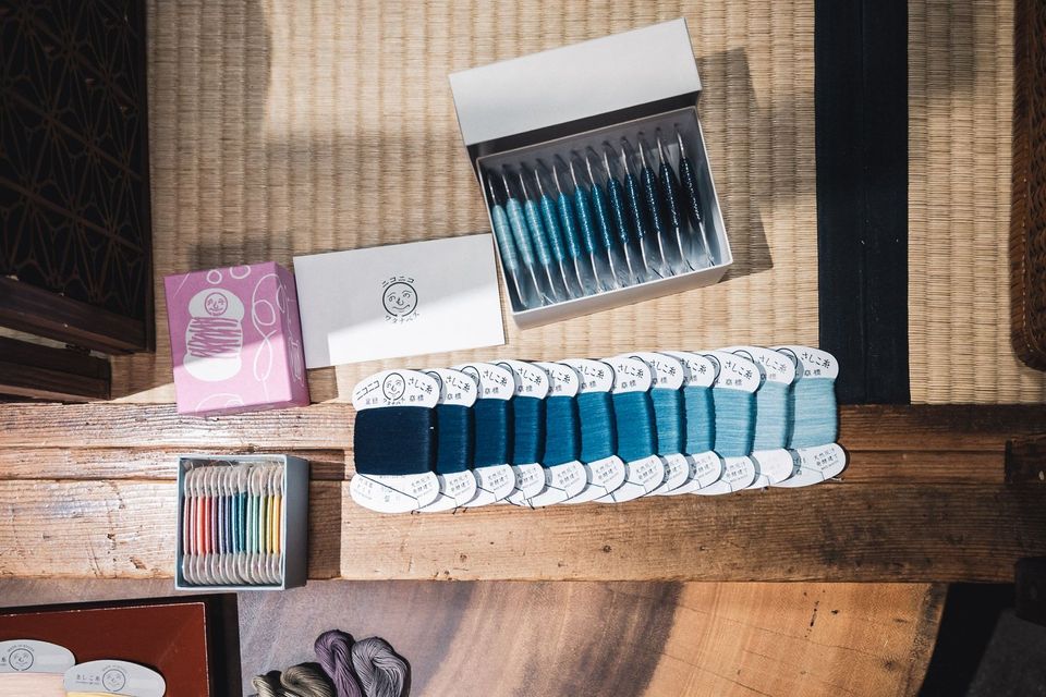 Many different shades of indigo thread by Itoroku.